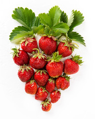 Fresh ripe strawberry berries on white background. Top view.