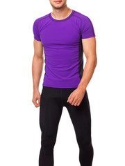 Аthlete in a purple sports t-shirt plays sports on a white background