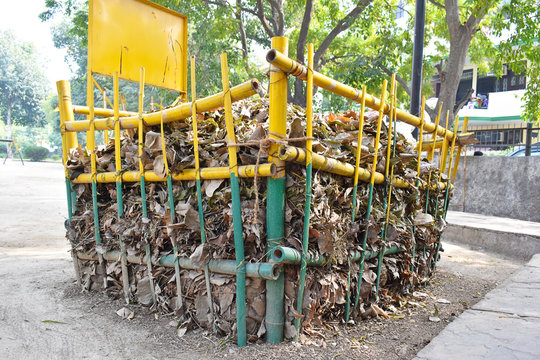 Large size big bamboo bin in garden for putting dry leaves for producing compost from leaves
