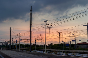 Fototapeta na wymiar train station at sunset in italy