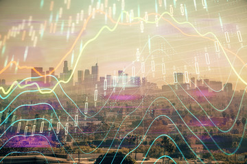 Forex chart on cityscape with skyscrapers wallpaper multi exposure. Financial research concept.
