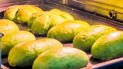 Bread is baked in an electric oven with manual controller