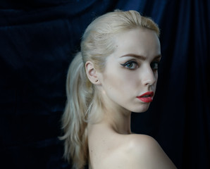 Portrait of beautiful young blond woman.