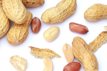 Close up top view peanuts on white background, focus on center