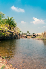 Fototapeta na wymiar urban Indian landscape with rivers, stones and bridge