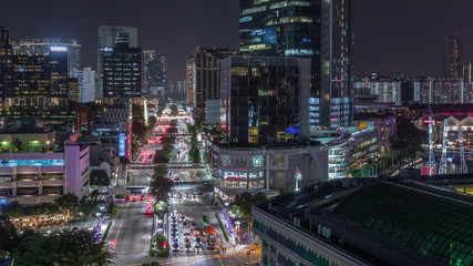 Aerial view of traffic on Eu Tong Sen Street and new bridge road all the way to Chinatown night timelapse © HyperlapsePro