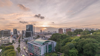 Sunset over Old Hill Street Police Station historic building in Singapore timelapse.