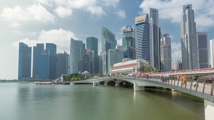Fototapeta premium Esplanade bridge and downtown core skyscrapers in the background Singapore timelapse hyperlapse