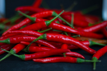 Red hot fresh raw chili peppers. A backdrop of red hot chilli peppers.