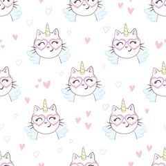 Cute seamless pattern with white cat in a unicorn costume with wings and rainbow horn. It can be used for packaging, wrapping paper, textile and etc.
