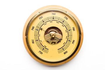 Vintage style barometer isolated on white wall background