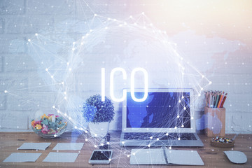 Multi exposure of blockchain and crypto economy theme hologram and table with computer background....