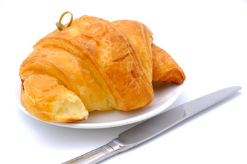 Breakfast served, croissants. Balanced diet.