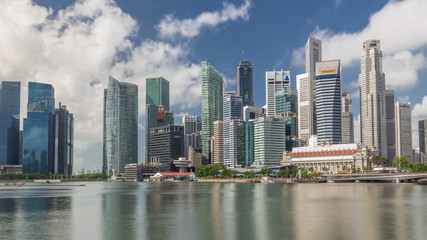 Obraz na płótnie Canvas Business Financial Downtown City and Skyscrapers Tower Building at Marina Bay timelapse hyperlapse, Singapore,