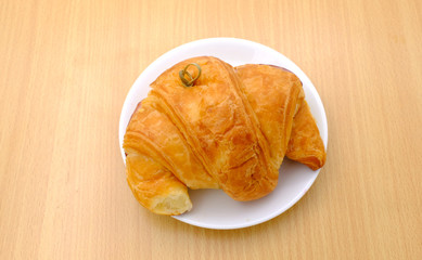 Breakfast served, croissants. Balanced diet.