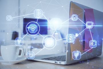 Computer on desktop with social network hologram. Multi exposure. Concept of international people connections.