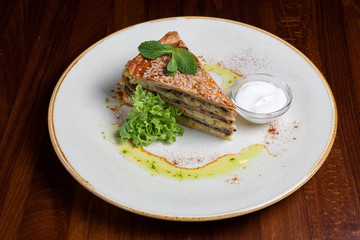A piece of cake with mint.