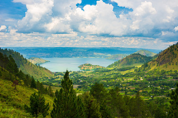 Lake Toba and Samosir Island view from above Sumatra Indonesia. Huge volcanic caldera covered by...