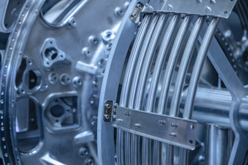 Turbine Engine. Aviation Technologies. Aircraft jet engine detail during maintenance. Blue toned.