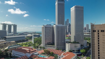 A beautiful morning panorama with Marina Bay area and skyscrapers city skyline aerial timelapse hyperlapse.