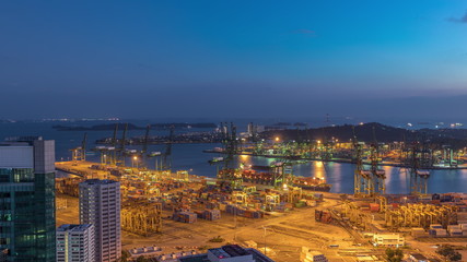 Commercial port of Singapore aerial day to night timelapse.