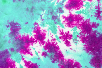 tie dye pattern hand dyed on cotton fabric abstract texture background.