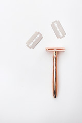 rose-gold safety shaving razor with blades