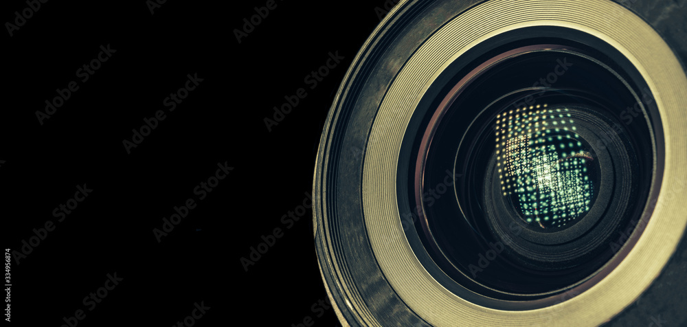 Poster Beautiful camera lens with light reflection. Background pattern for design. Macro photography view..