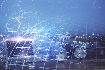 Multi exposure of table with computer and world map hologram. International data network concept.