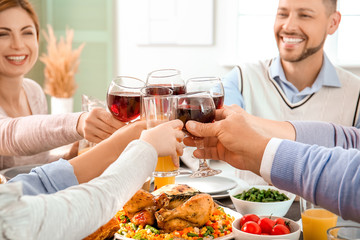 Family celebrating Thanksgiving Day at home