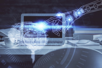 Double exposure of table with computer and brain hologram. Data innovation concept.