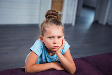 Lifestyle portrait of sad bored girl at home isolation 