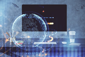 Multi exposure of table with computer and world map hologram. International data network concept.