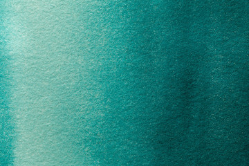 Abstract art background light turquoise and green colors. Watercolor painting on canvas with soft emerald gradient.