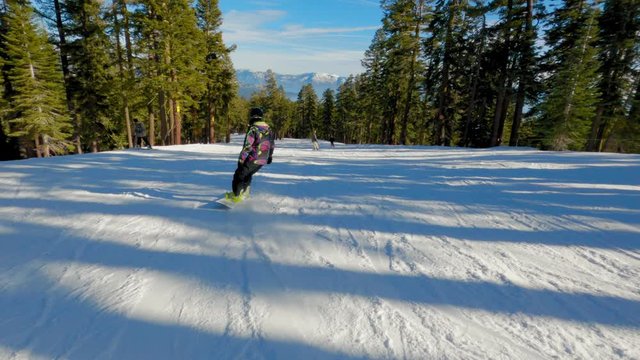 snowboarding down the slopes in lake tahoe