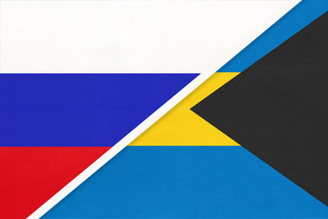 Russia vs The Bahamas national flag from textile. Relationship and partnership between two countries.