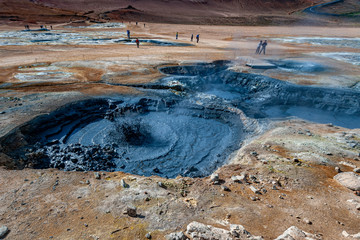 Beautiful colourful Icelandic landscape lava fields mountain geysers zigzag road and moss-covered...