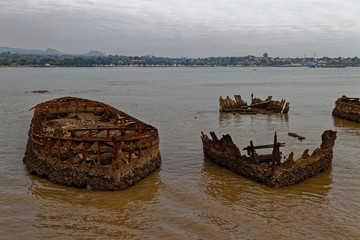 Several rusting Wrecks of boats lie abandoned on Sao Tome Island where the Previous Owners just ran...