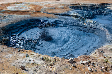 Beautiful colourful Icelandic landscape lava fields mountain geysers zigzag road and moss-covered...
