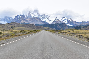 Street to Glacier National Park in El Chalten, Argentina, Patagonia with snow covered Fitz Roy...