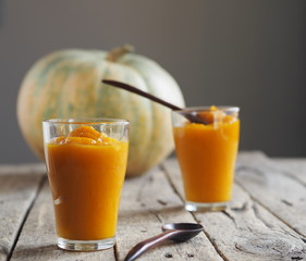 Health benefits of pumpkin. Pumpkin pulp passed through a blender. Eco-friendly homemade smoothie. Home cooking.