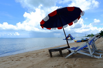 Beach chairs on a sunny day by the sea