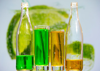 Glasses and bottles of sparkling water made from pear and tarragon