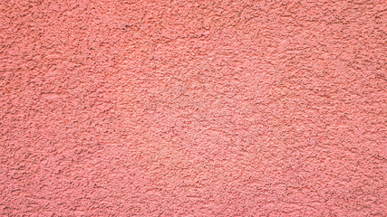 Pink abstract cement background. Blank concrete wall in pink color.