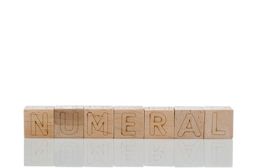 Wooden cubes with letters numeral on a white background