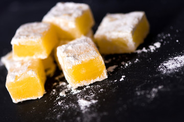 Sweet pieces of yellow turkish delight  .