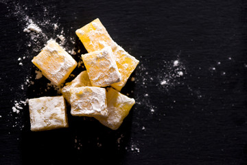 Sweet pieces of yellow turkish delight  .