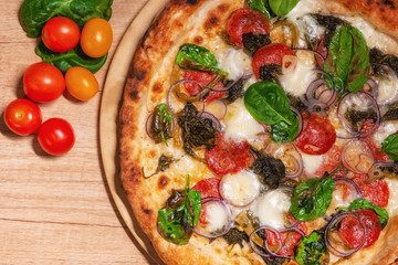 Delicious baked pizza and vegetables