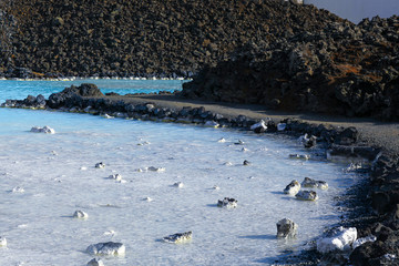 clear water sky blue colors on a lava field. The blue Lagoon in Iceland