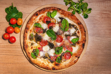 Delicious baked pizza and vegetables